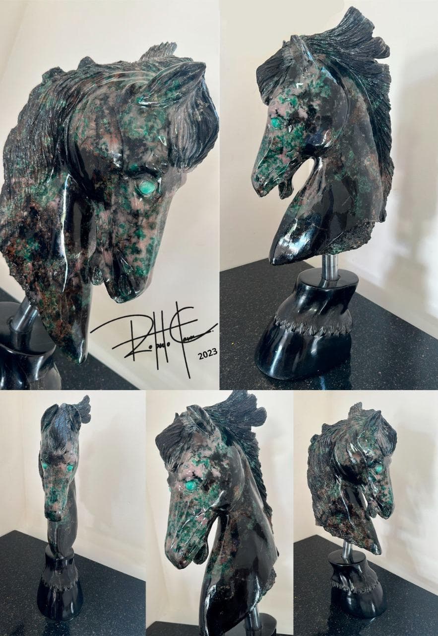Signed horse sculpture carved from emerald matrix