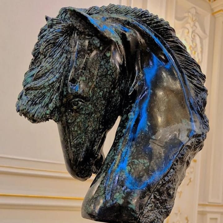 Horse head in emerald matrix