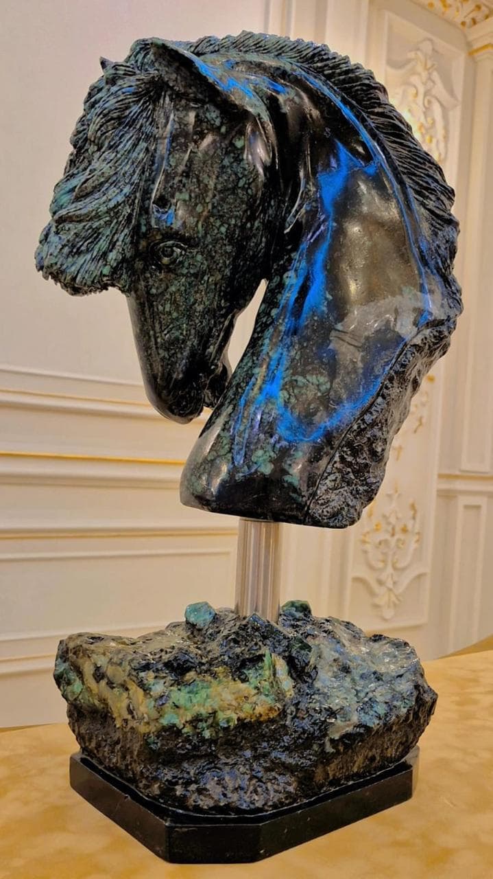 Horse carved from emerald matrix