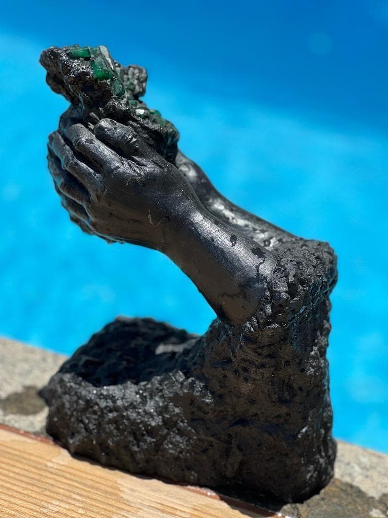 The prospector's hand, in the rough
